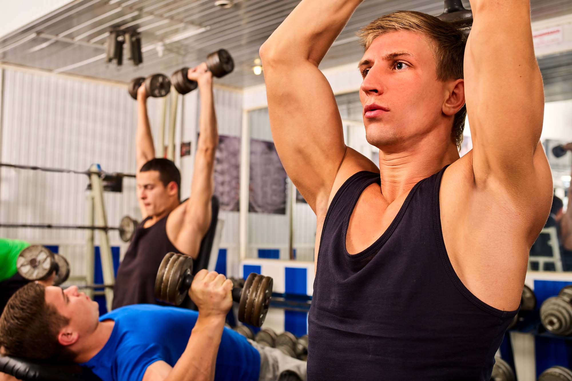 men lifting weights