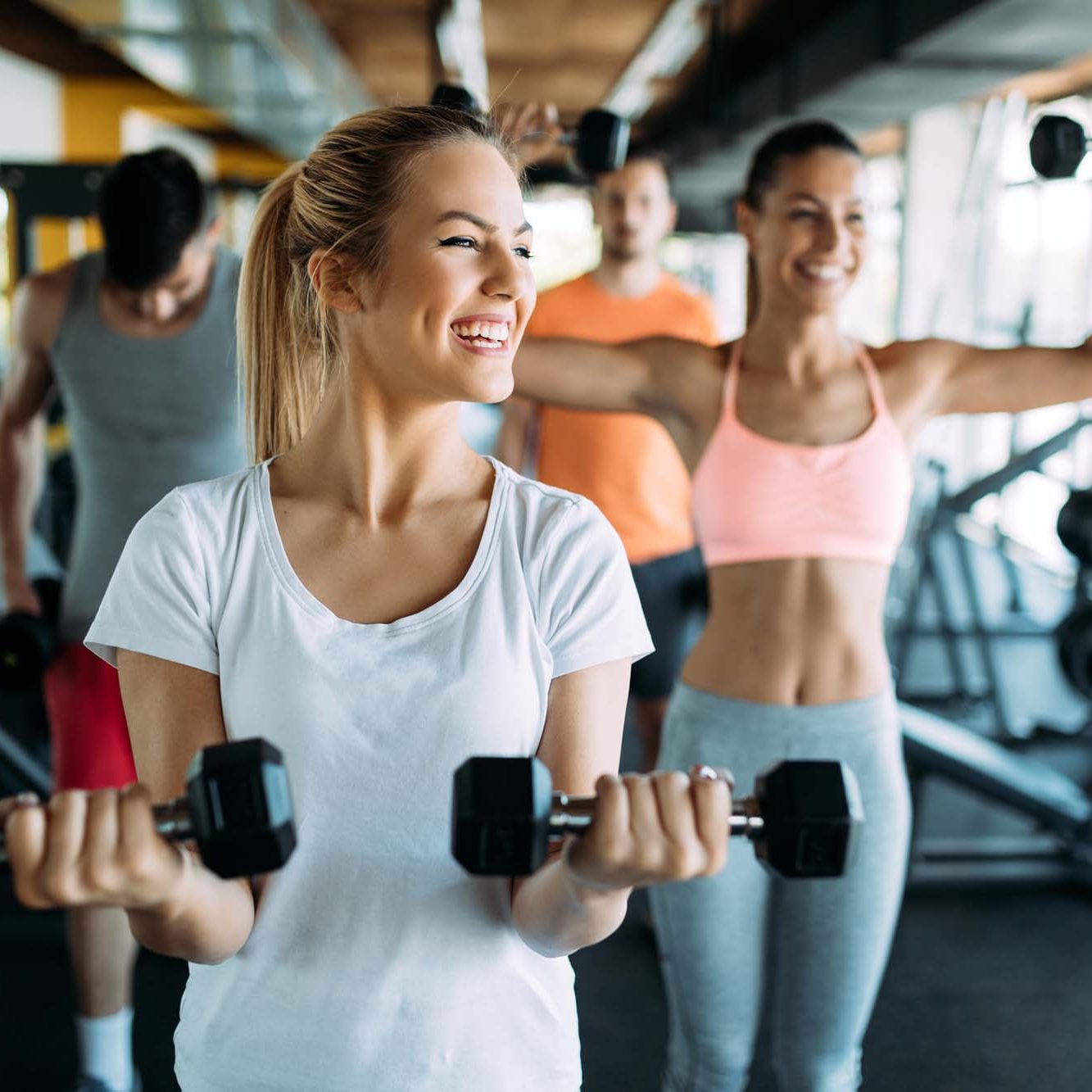 girls lifting weights